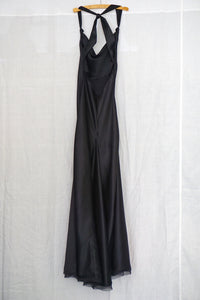 Full length 100% premium silk satin dress with knot in back and knotted at front end of straps. The bias cut gives this dress great flow.  Silk chiffon trim on bottom hem. Unlined.