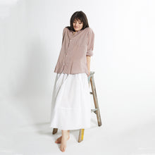 Load image into Gallery viewer, Model wearing Oversized cotton voile shirt with pearl shell buttons.
