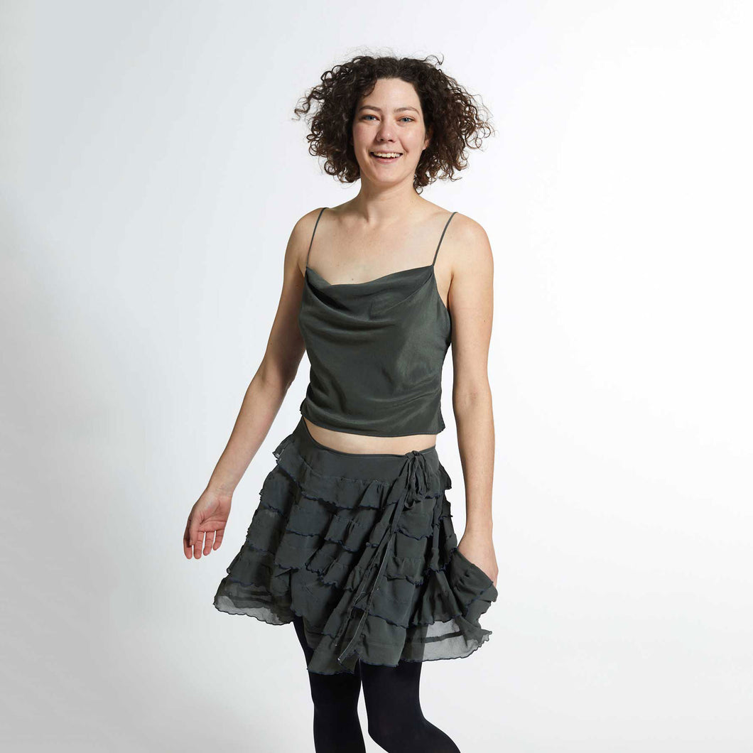 A beautiful silk georgette short ruffled skirt with elastic waist.  100% silk georgette, hand dyed, machine washable.