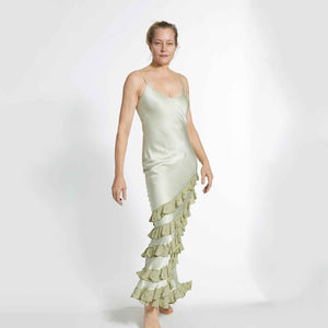 Doubled 100% Silk Satin Dress cut on the bias.  Embroidered ruffles in Rami.  Spaghetti straps with adjusters.